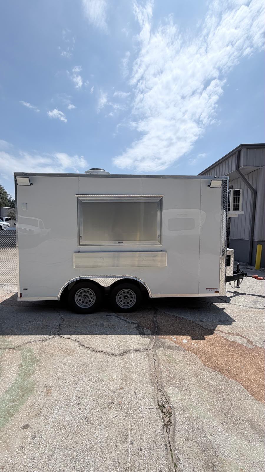 Side view with service window and fold-down counter, closed for travel