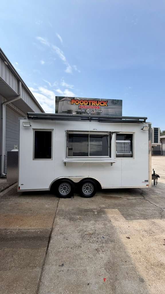 Serving side with windows and awning rail, outside our shop
